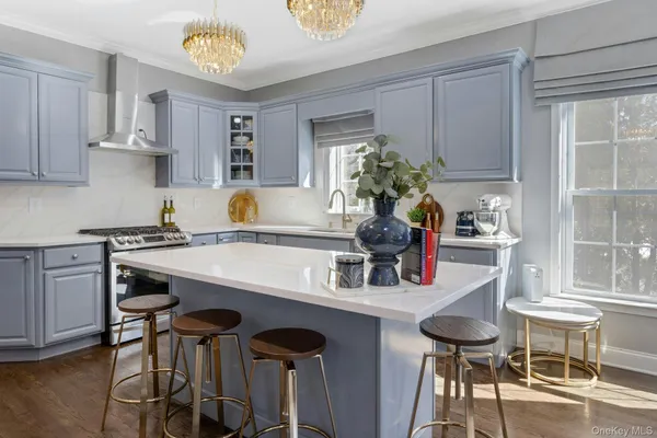 a kitchen with a table and chairs in it