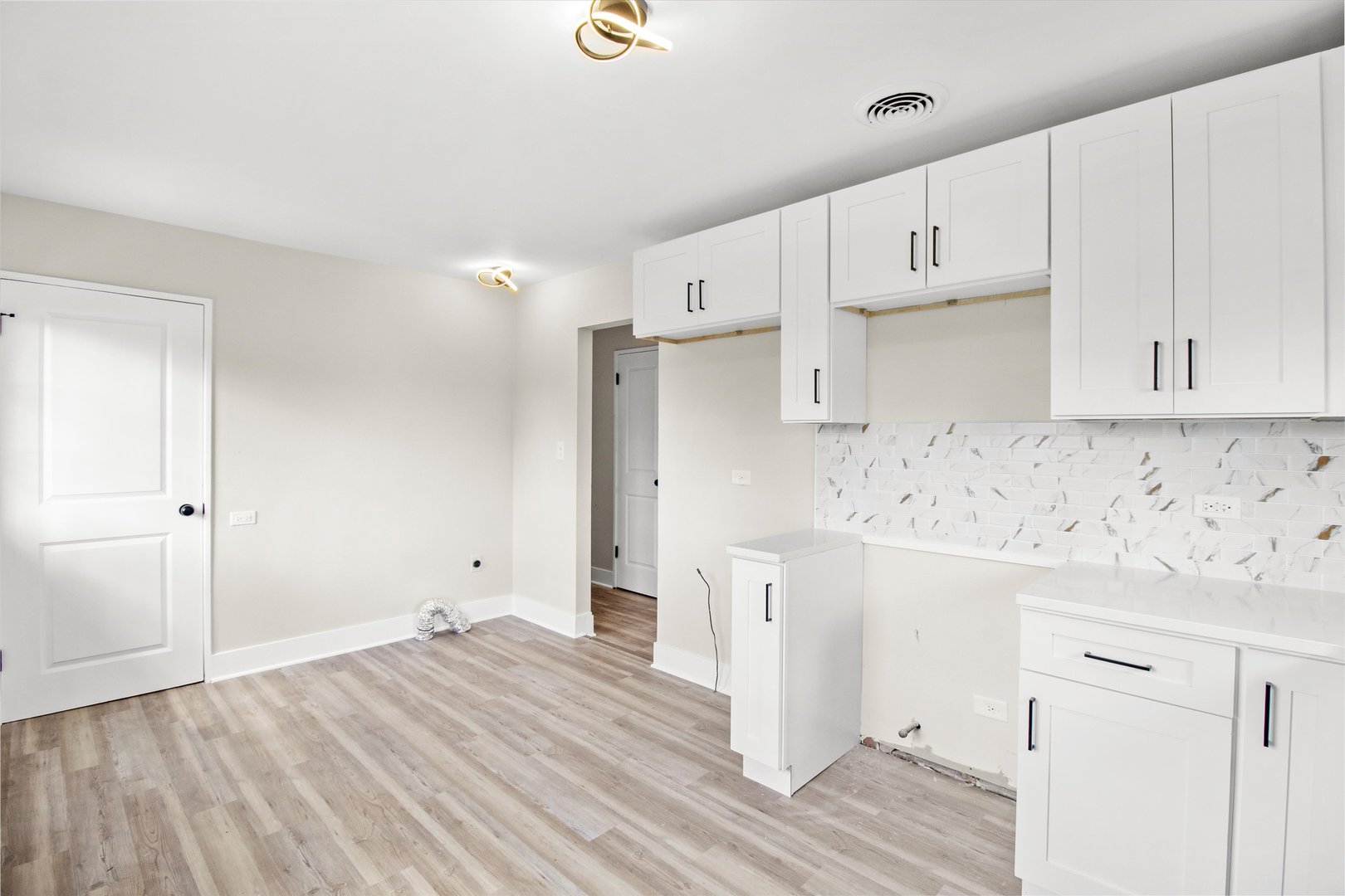 16460 Honore Avenue Markham, IL 60428 - Photo 11 of 38 a view of kitchen with wooden floor