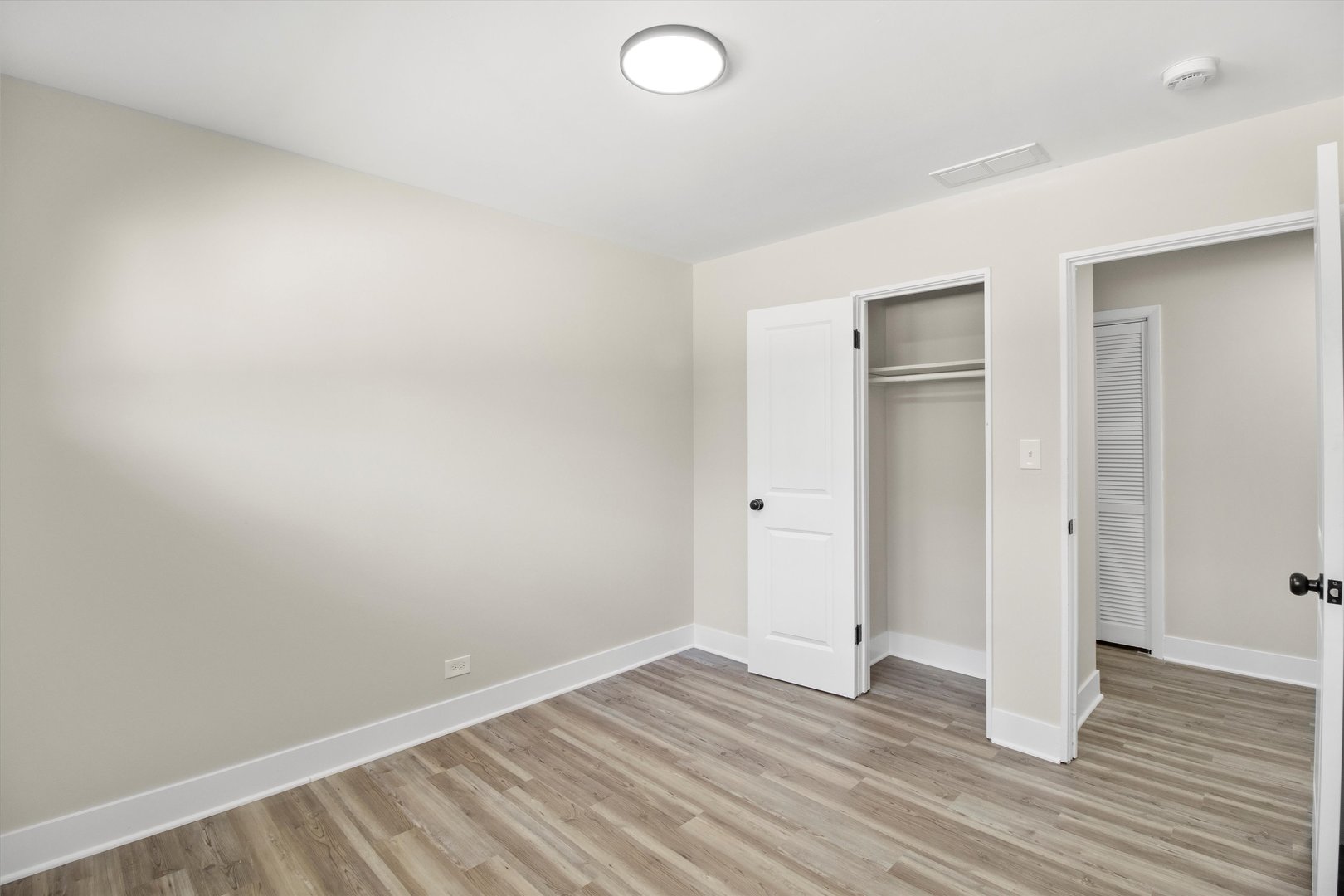 16460 Honore Avenue Markham, IL 60428 - Photo 28 of 38 a view of empty room with wooden floor