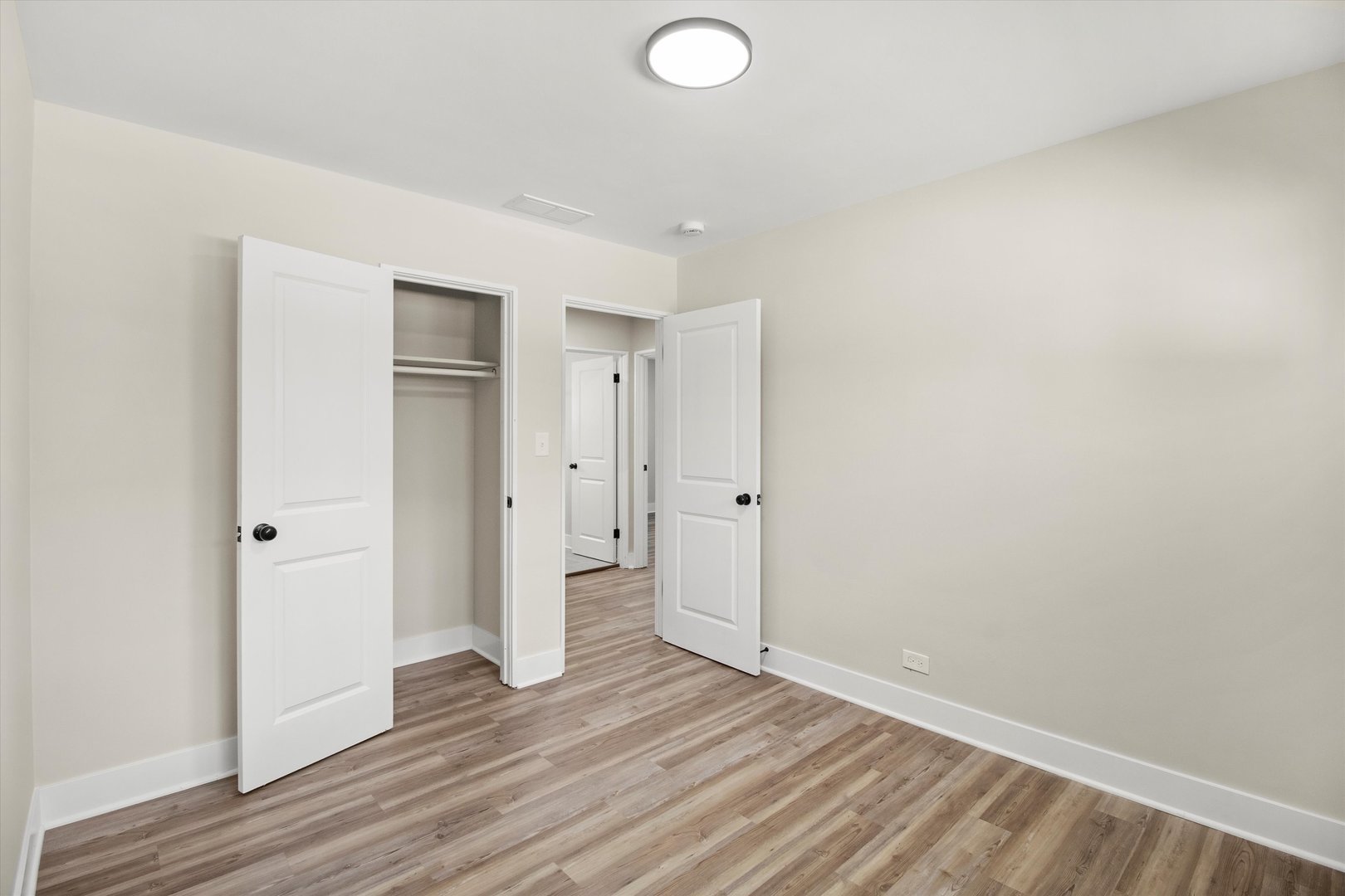 16460 Honore Avenue Markham, IL 60428 - Photo 30 of 38 a view of wooden floor and windows in a room