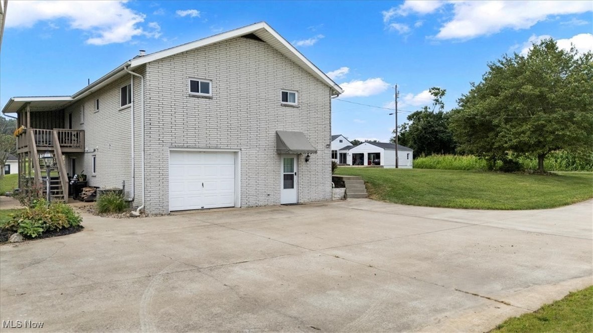 Nicely paved driveway offers lots of room for parking