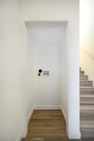 a view of a backyard with potted plants