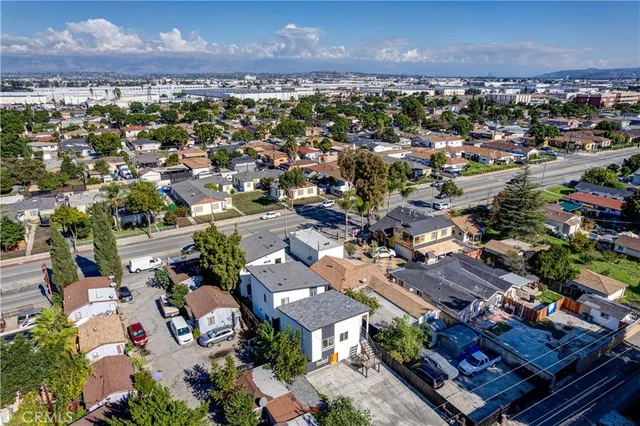 an aerial view of a city with lots of residential buildings