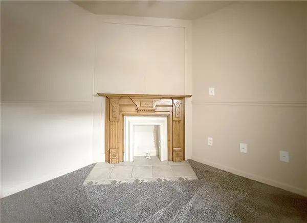 a view of a livingroom with a fireplace