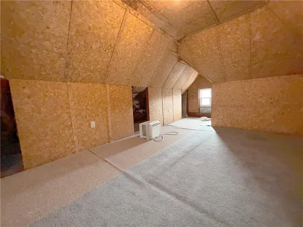 a view of a big room with wooden floor