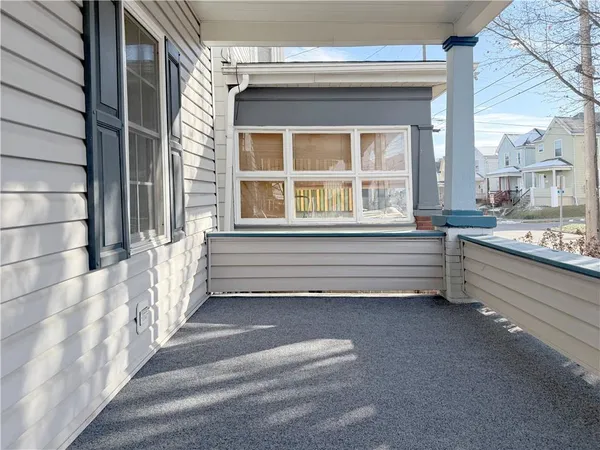 a view of a house with a large window