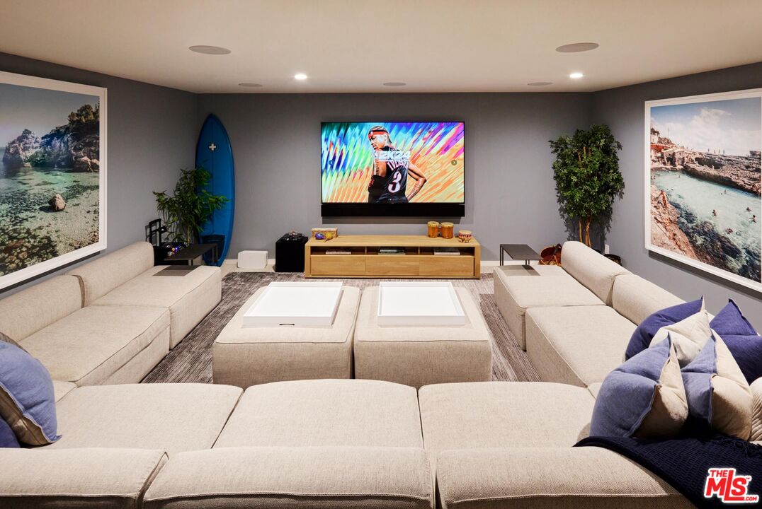 330 Rennie Avenue, Unit 1 Venice, CA 90291 - Photo 25 of 34 a living room with furniture and a flat screen tv