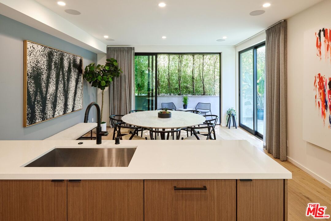330 Rennie Avenue, Unit 1 Venice, CA 90291 - Photo 8 of 34 a view of a very nice looking dining room with a table and chairs