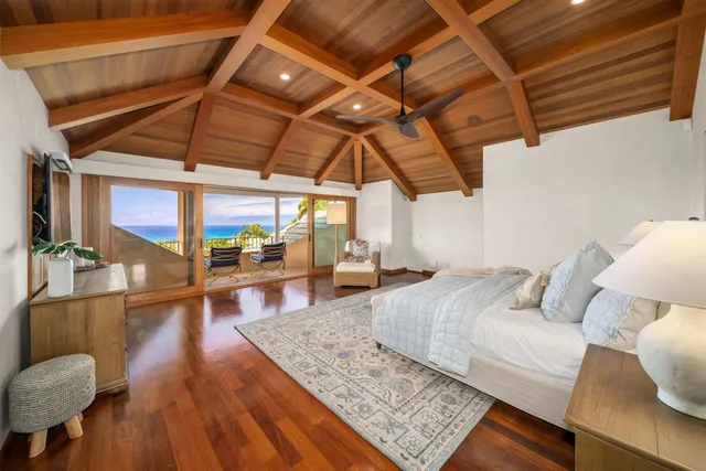 a living room with lots of furniture and a rug
