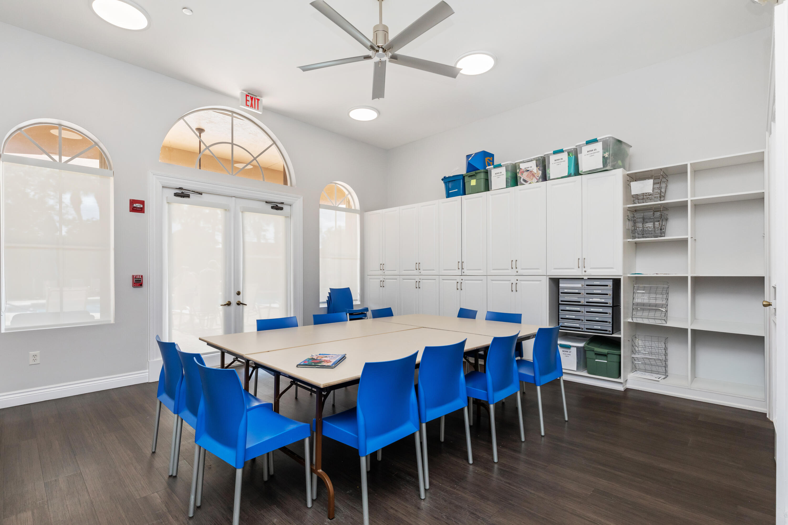 6698 Vía Roma Delray Beach, FL 33446 - Photo 41 of 50 a view of a dining room with furniture and wooden floor