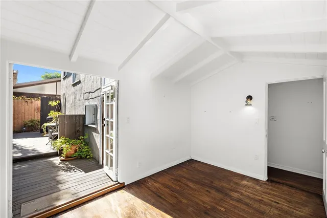 a view of a livingroom with wooden floor