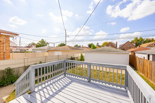 a view of balcony with wooden floor