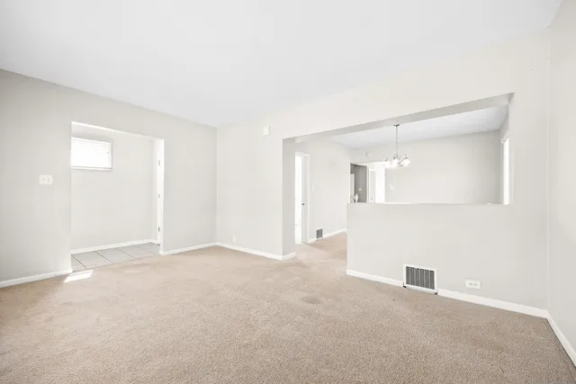 an empty room with an entryway