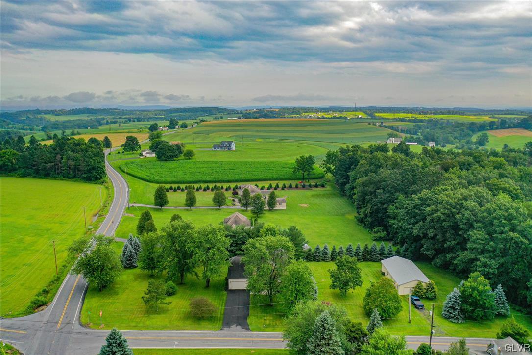 1743 Pen Argyl Road Pen Argyl, PA 18072 - Photo 2 of 38 a view of a golf course with a lake