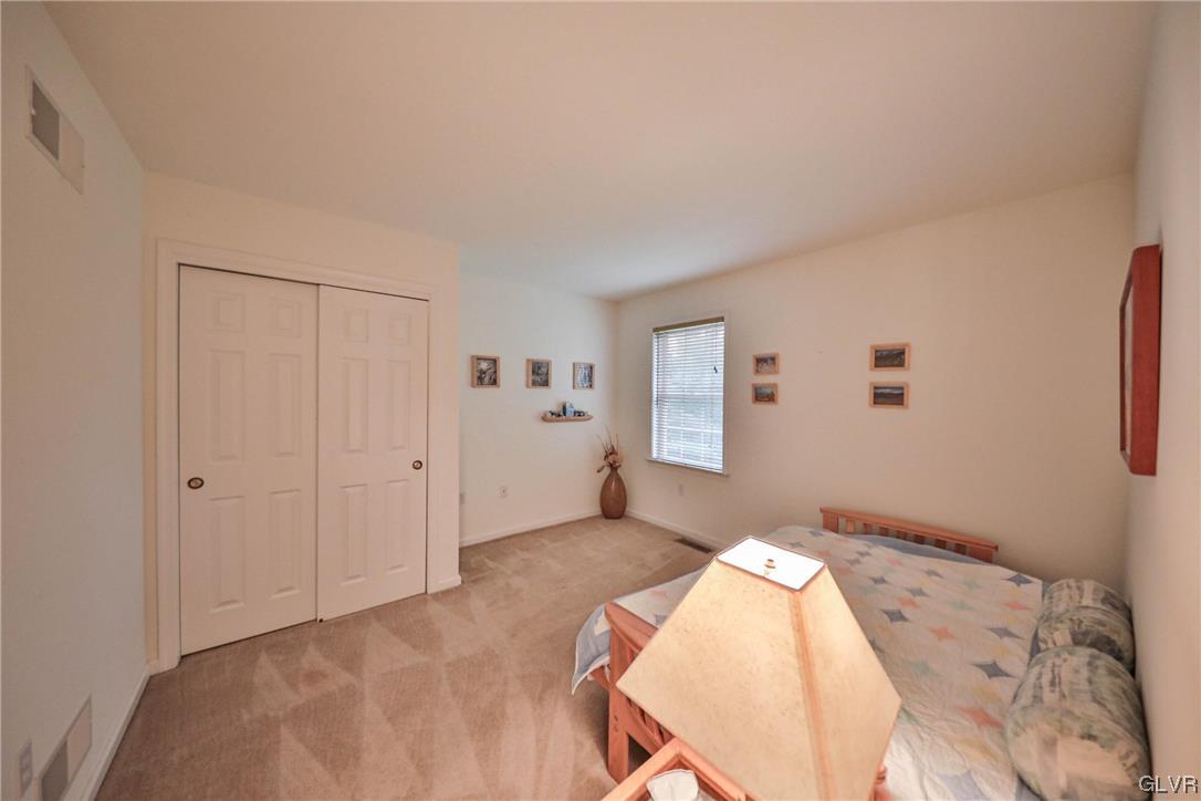 1743 Pen Argyl Road Pen Argyl, PA 18072 - Photo 25 of 38 a bedroom with a bed and a window