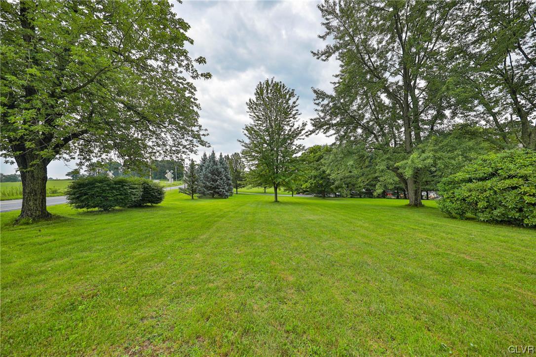 1743 Pen Argyl Road Pen Argyl, PA 18072 - Photo 34 of 38 a view of green field with trees in the background