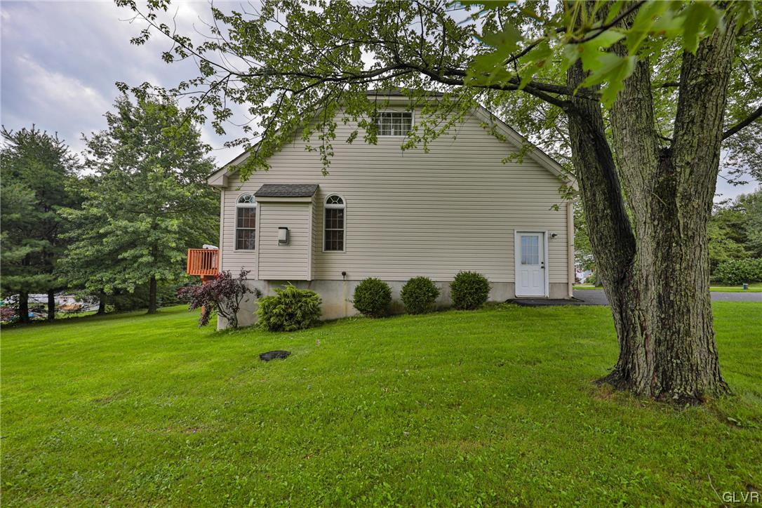 1743 Pen Argyl Road Pen Argyl, PA 18072 - Photo 37 of 38 a front view of house with yard and green space