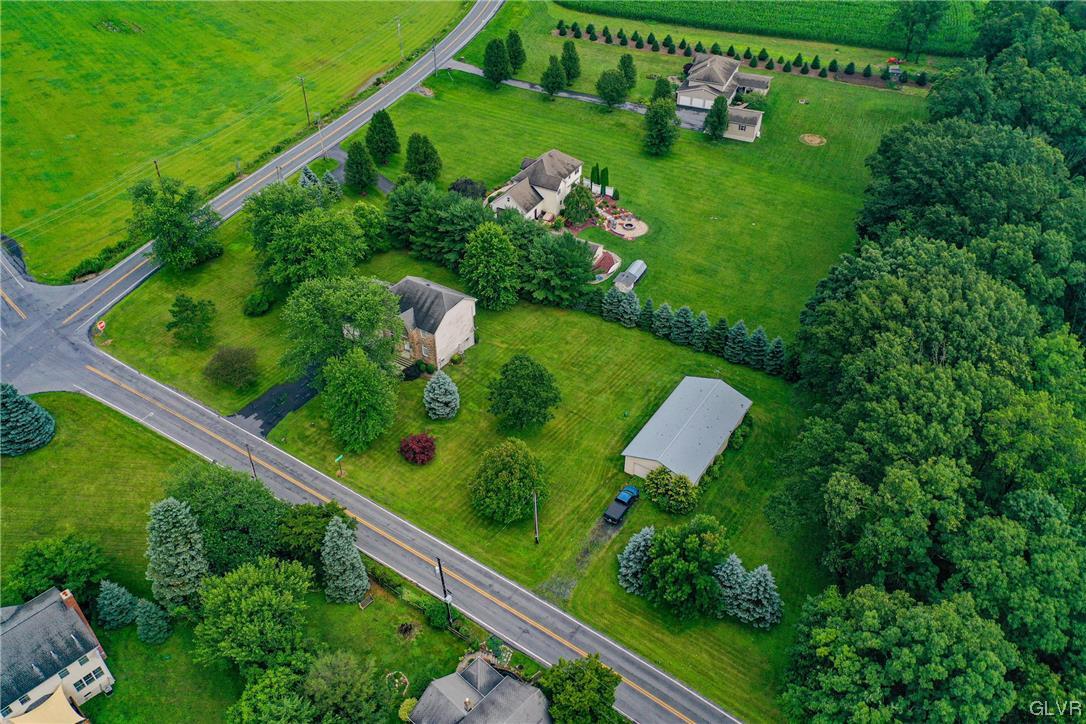 1743 Pen Argyl Road Pen Argyl, PA 18072 - Photo 4 of 38 a view of a yard with plants