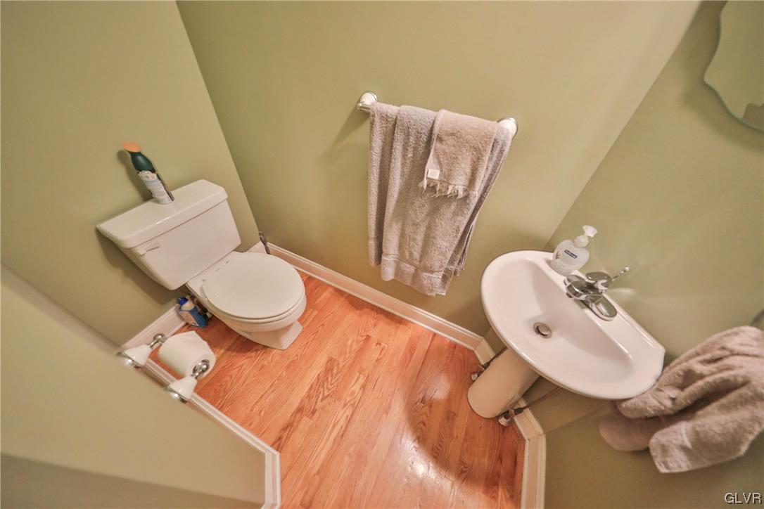 1743 Pen Argyl Road Pen Argyl, PA 18072 - Photo 10 of 38 a bathroom with a toilet sink and mirror