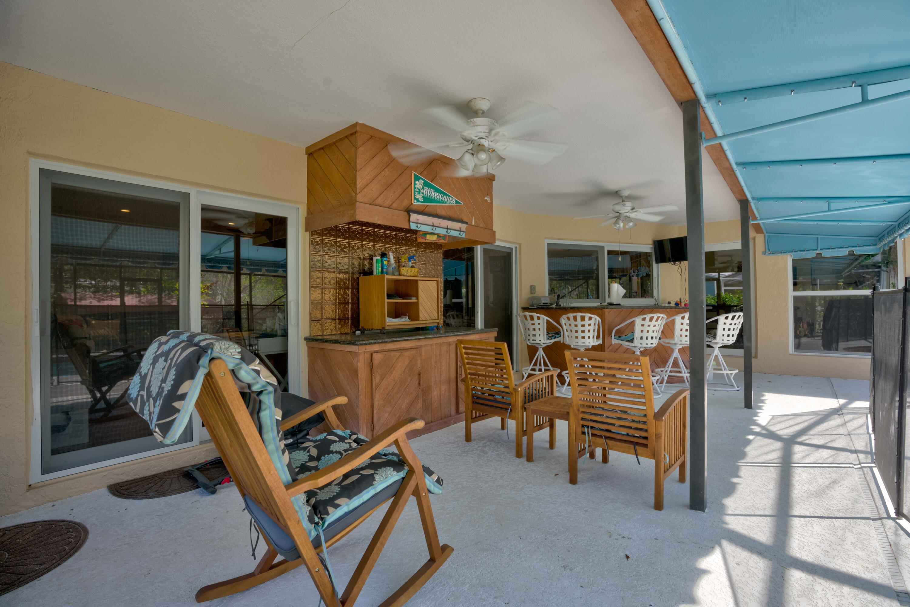 9524 Southeast Cove Point Street Jupiter, FL 33469 - Photo 10 of 58 Covered patio