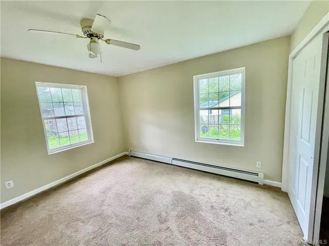 an empty room with windows