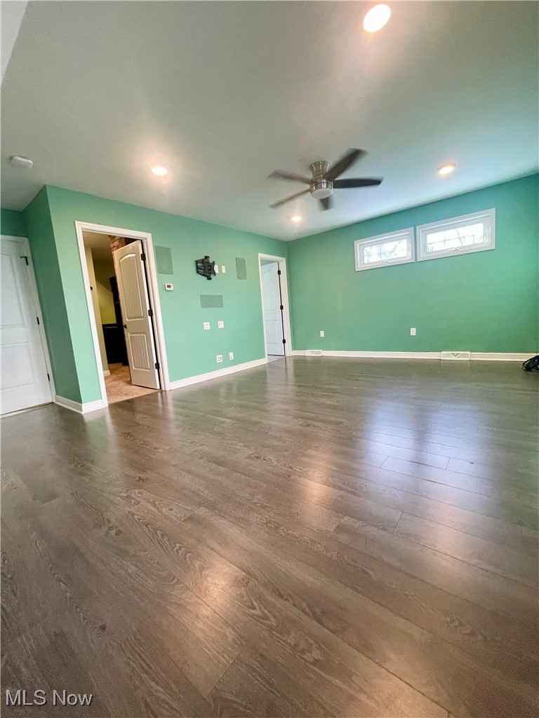 1544 Edgefield Road Lyndhurst, OH 44124 - Photo 27 of 36 Unfurnished living room with dark wood finished floors, recessed lighting, and ceiling fan