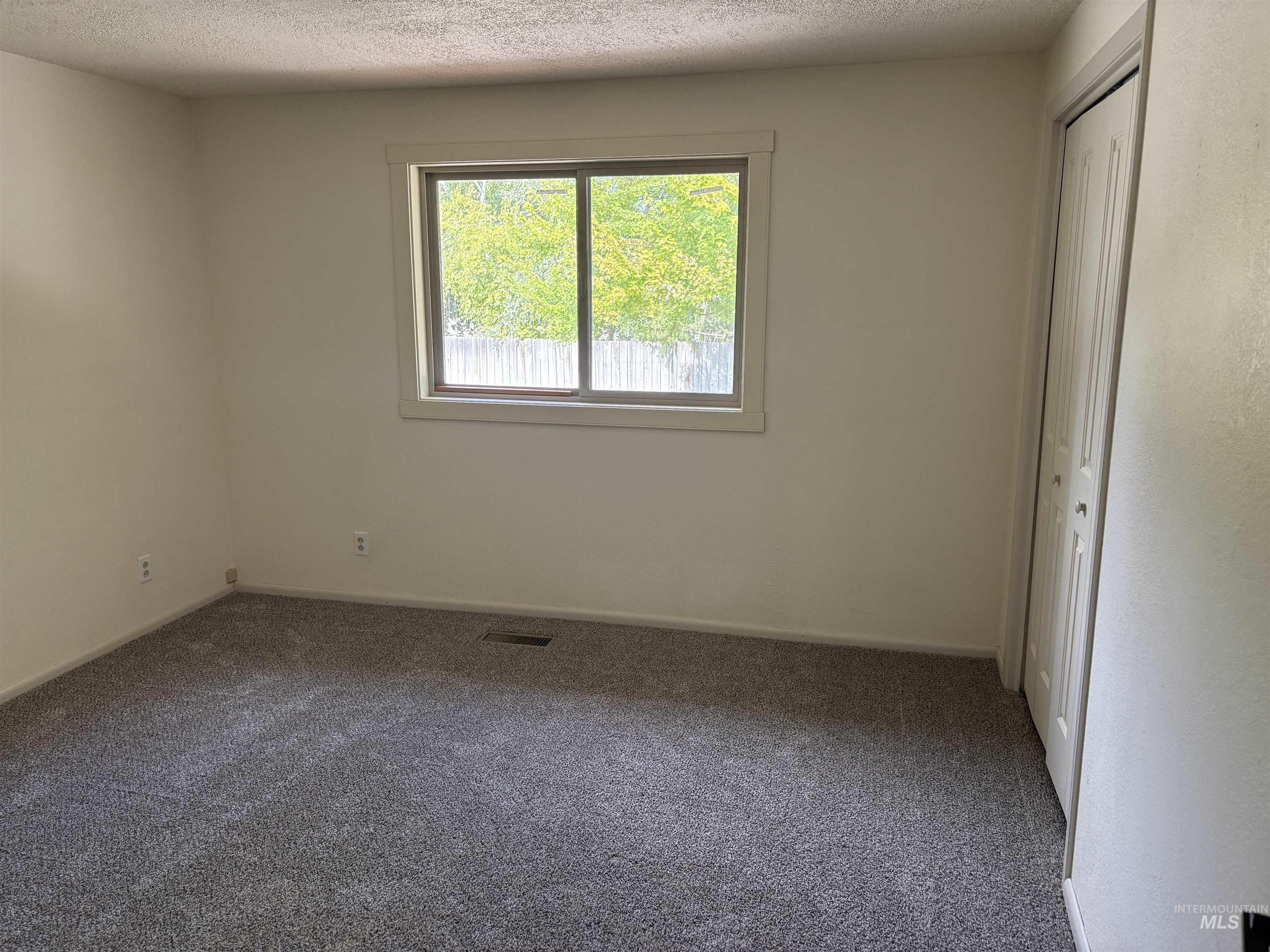 513 Ridge Way Ontario, OR 97914 - Photo 18 of 29 Wood-finish flooring throughout, complemented by light-toned wall paint and white baseboards