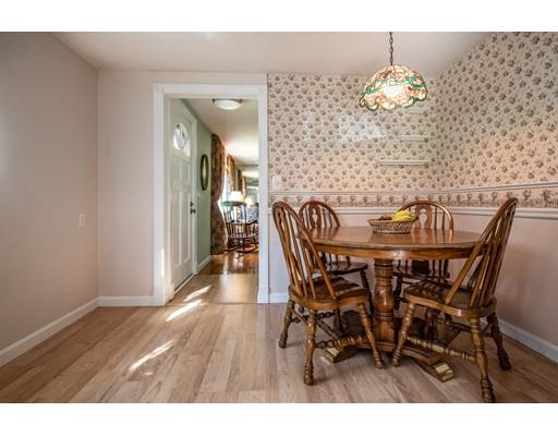 66 Audley Road Springfield, MA 01118 - Photo 13 of 30 a view of a dining room with furniture and wooden floor