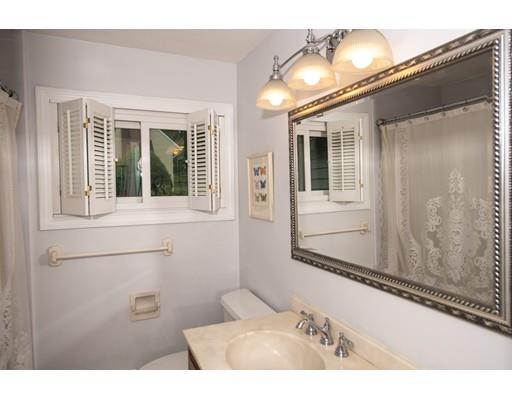 66 Audley Road Springfield, MA 01118 - Photo 15 of 30 a bathroom with a sink and a mirror