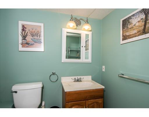 66 Audley Road Springfield, MA 01118 - Photo 21 of 30 a bathroom with a toilet sink and mirror