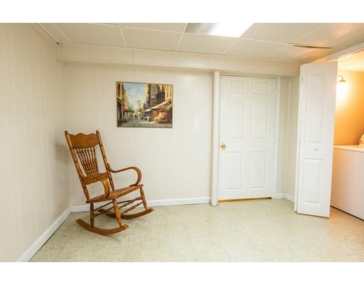66 Audley Road Springfield, MA 01118 - Photo 23 of 30 a view of a livingroom with furniture and a ceiling fan
