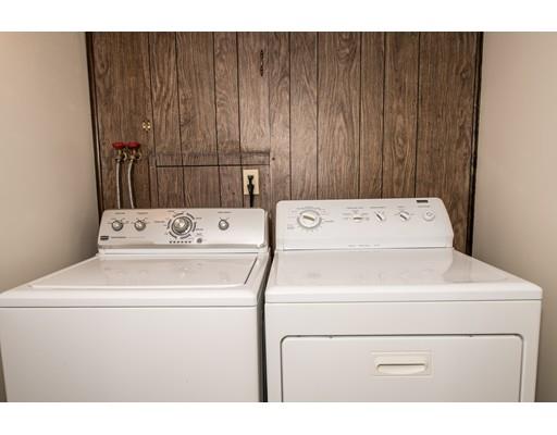 66 Audley Road Springfield, MA 01118 - Photo 25 of 30 a utility room with dryer and washer