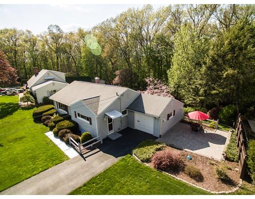 66 Audley Road Springfield, MA 01118 - Photo 3 of 30 an aerial view of a house with swimming pool and trees in the background