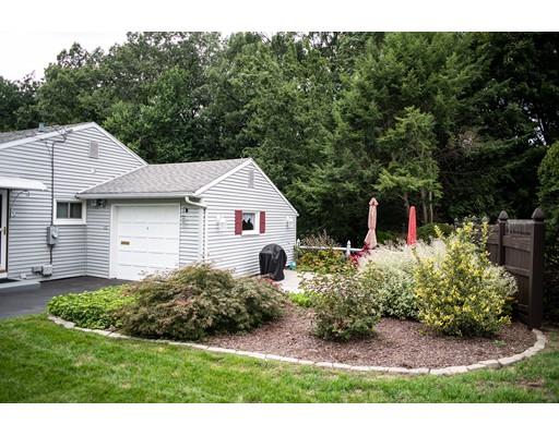66 Audley Road Springfield, MA 01118 - Photo 5 of 30 a front view of a house with a yard