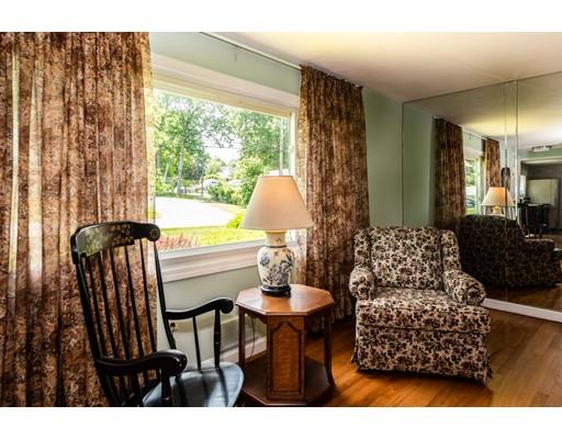 66 Audley Road Springfield, MA 01118 - Photo 10 of 30 a living room with furniture and a large window