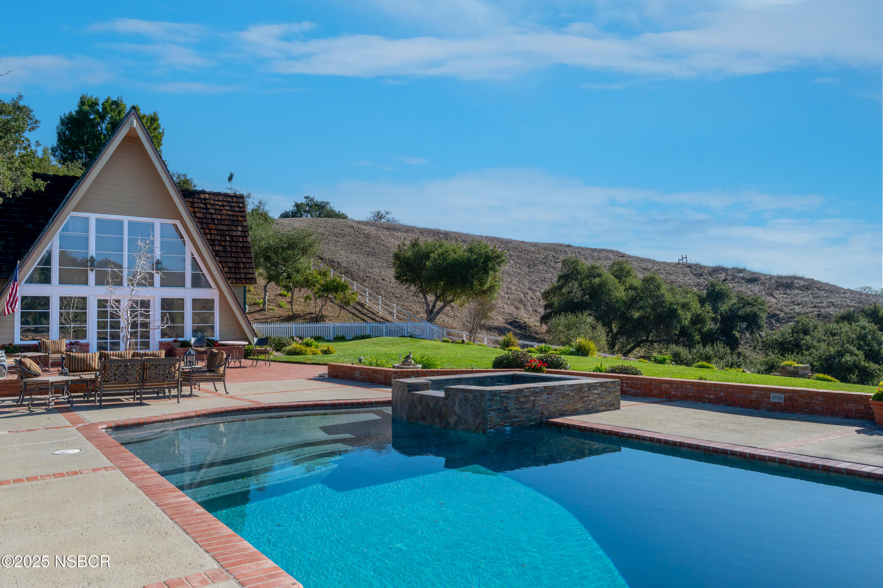 4086 East Oak Trail Road Santa Ynez, CA 93460 - Photo 2 of 57 swimming pool view with sitting space and garden view