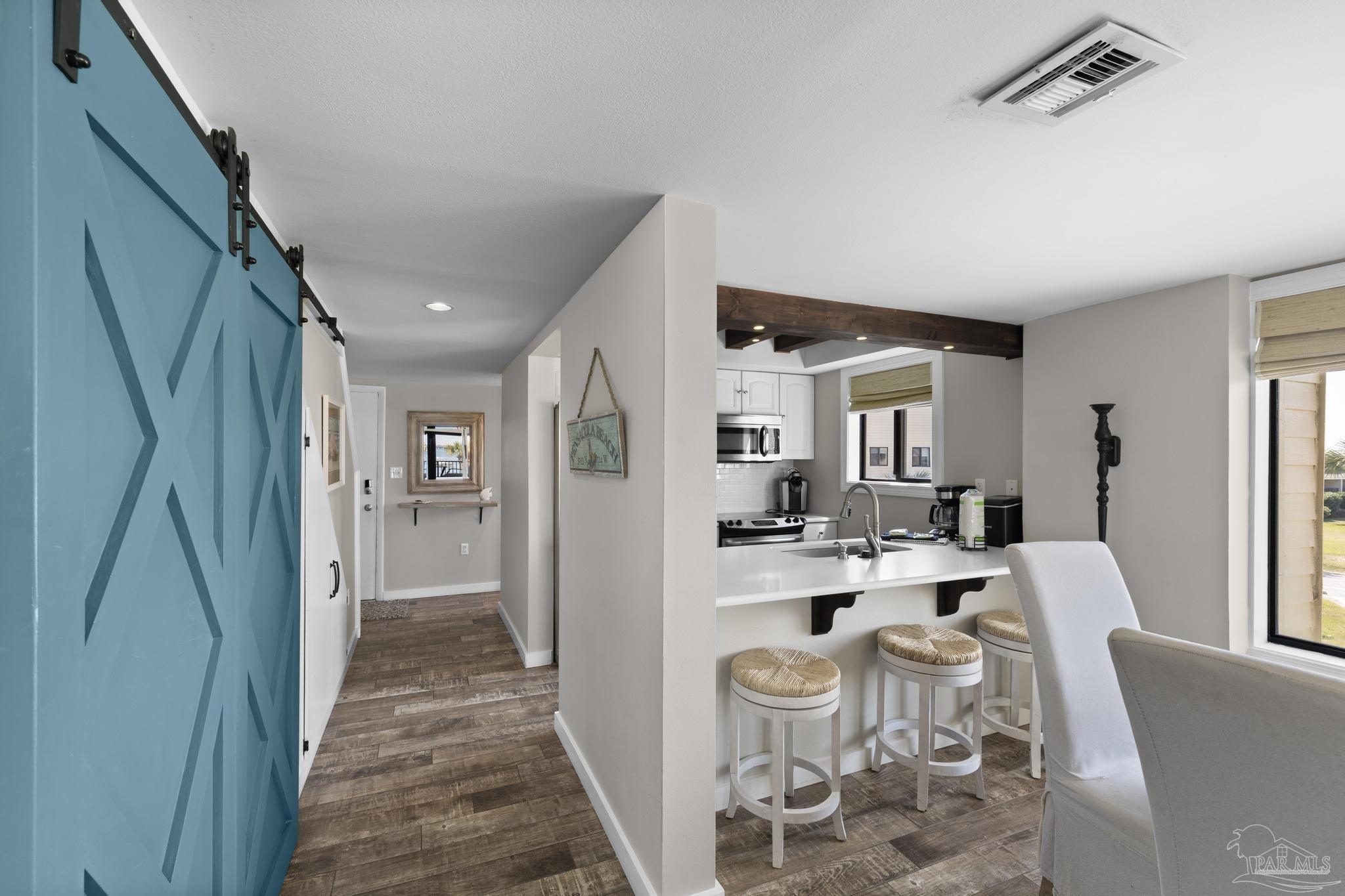 900 Fort Pickens Road, Unit 426 Pensacola Beach, FL 32561 - Photo 21 of 60 a very nice looking room with a large window