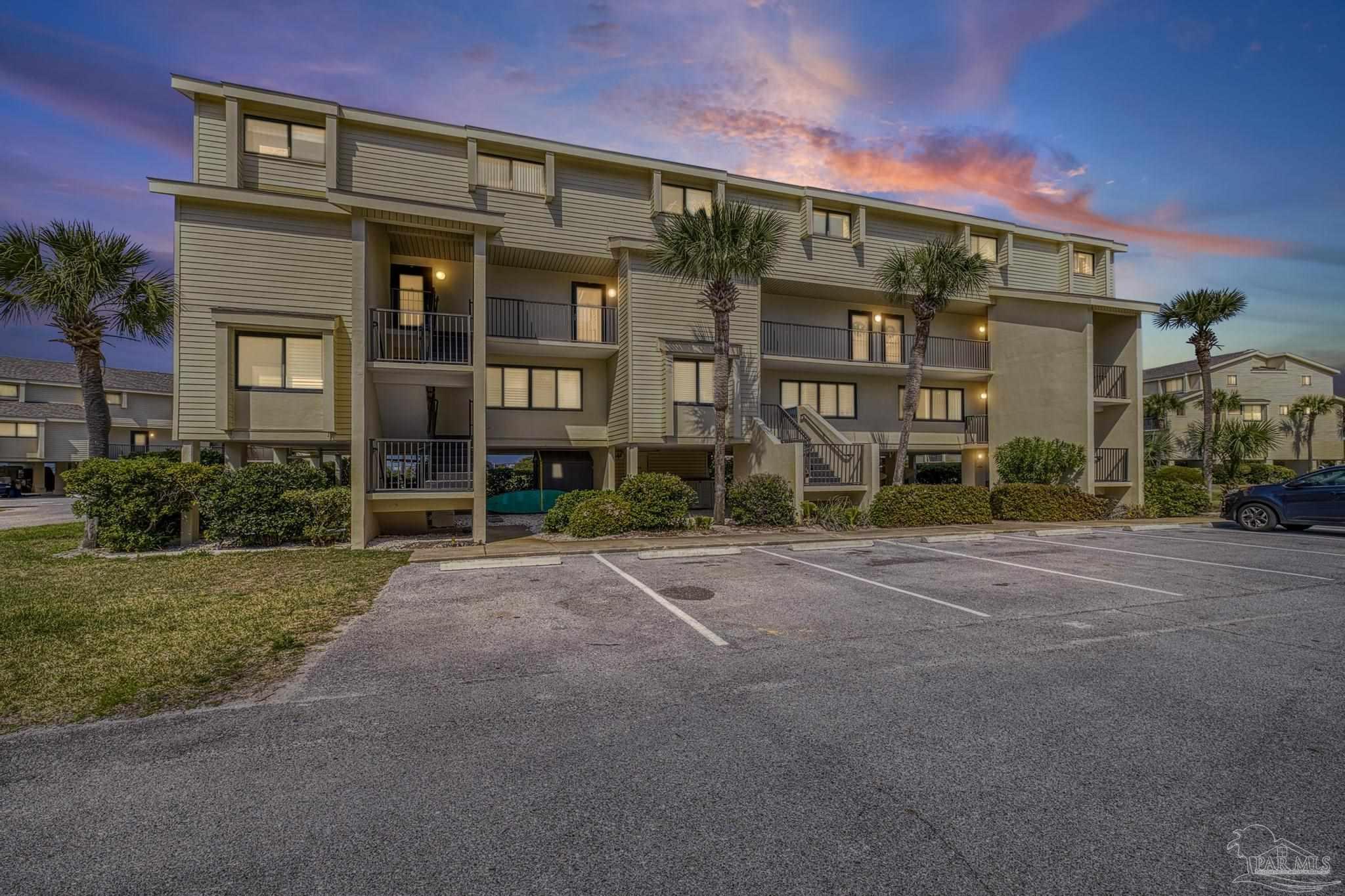 900 Fort Pickens Road, Unit 426 Pensacola Beach, FL 32561 - Photo 35 of 60 a front view of a building with street view