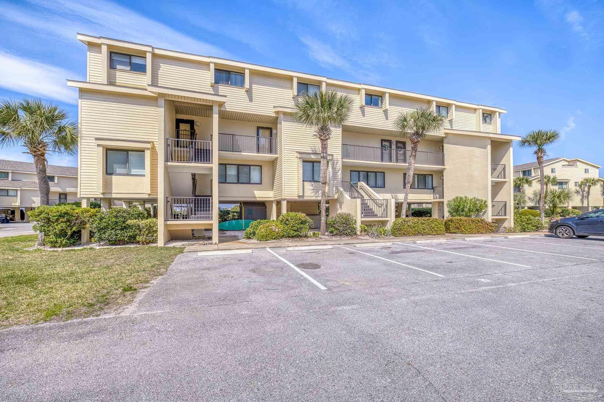 900 Fort Pickens Road, Unit 426 Pensacola Beach, FL 32561 - Photo 36 of 60 a front view of a building with street