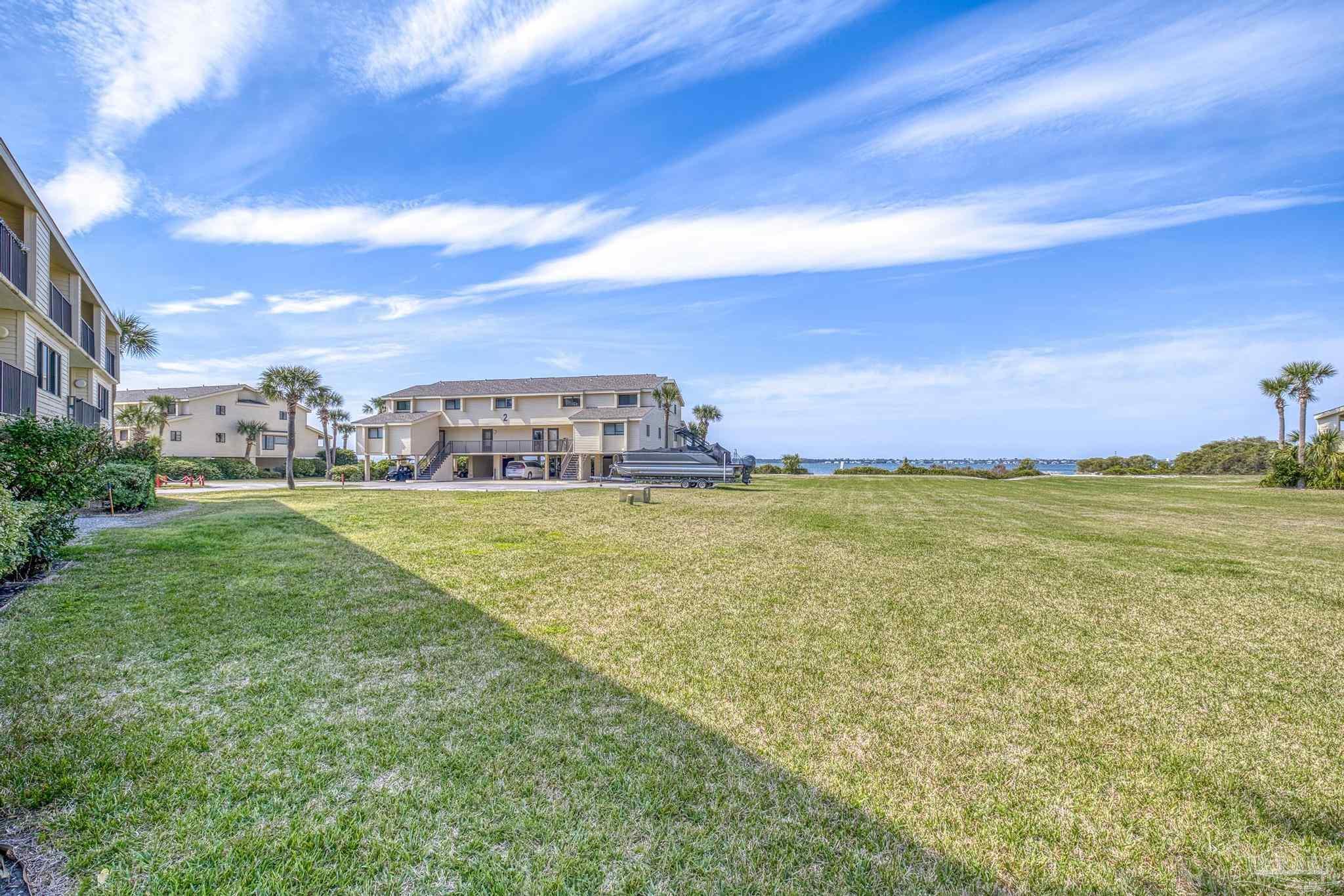 900 Fort Pickens Road, Unit 426 Pensacola Beach, FL 32561 - Photo 37 of 60 a view of houses with outdoor space