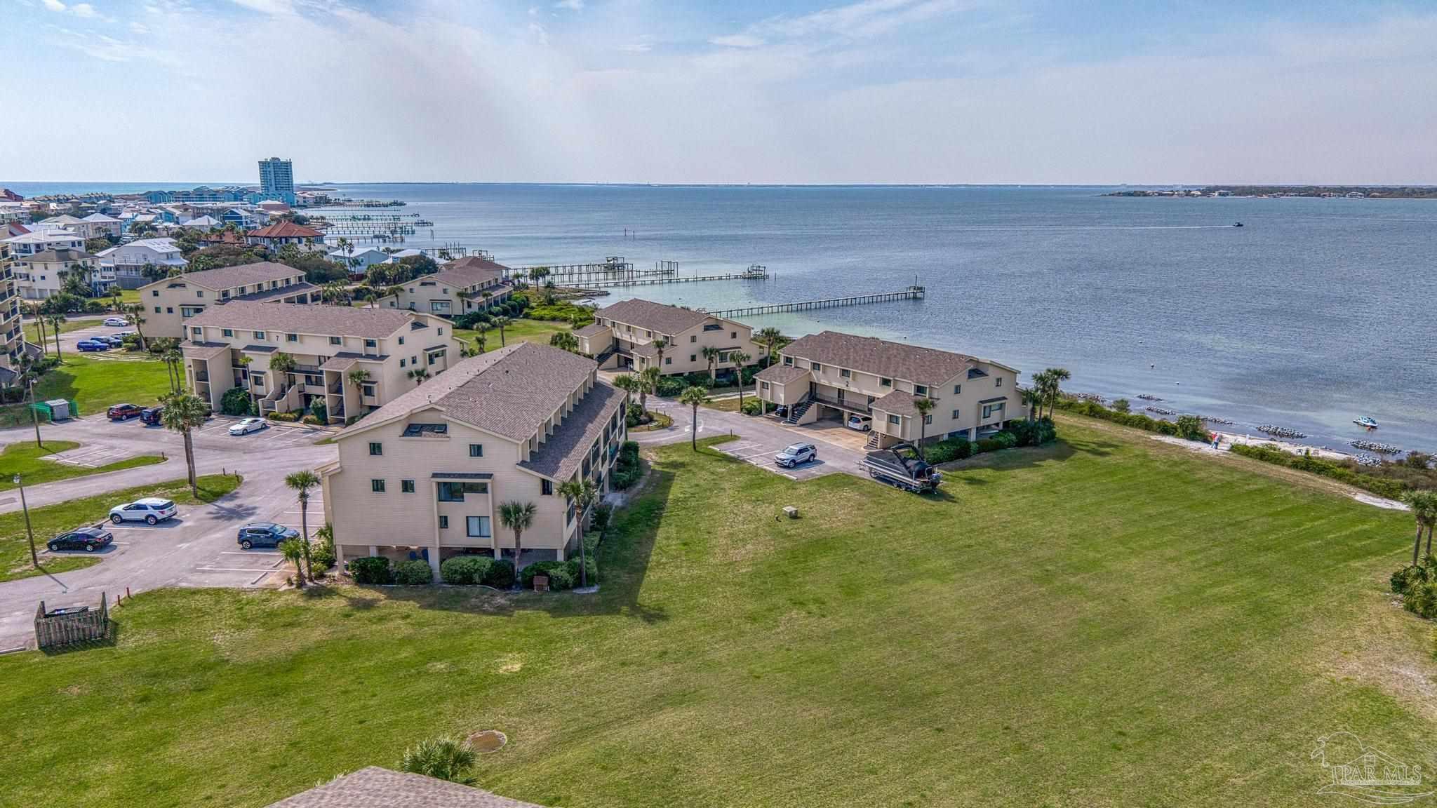 900 Fort Pickens Road, Unit 426 Pensacola Beach, FL 32561 - Photo 50 of 60 an aerial view of a house with a garden