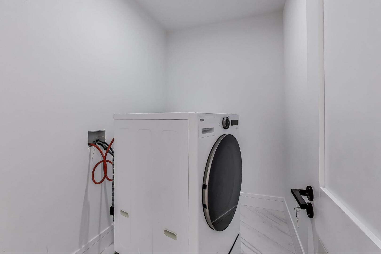 2307 West Foster Avenue, Unit 3 Chicago, IL 60625 - Photo 37 of 48 a utility room with dryer and washer