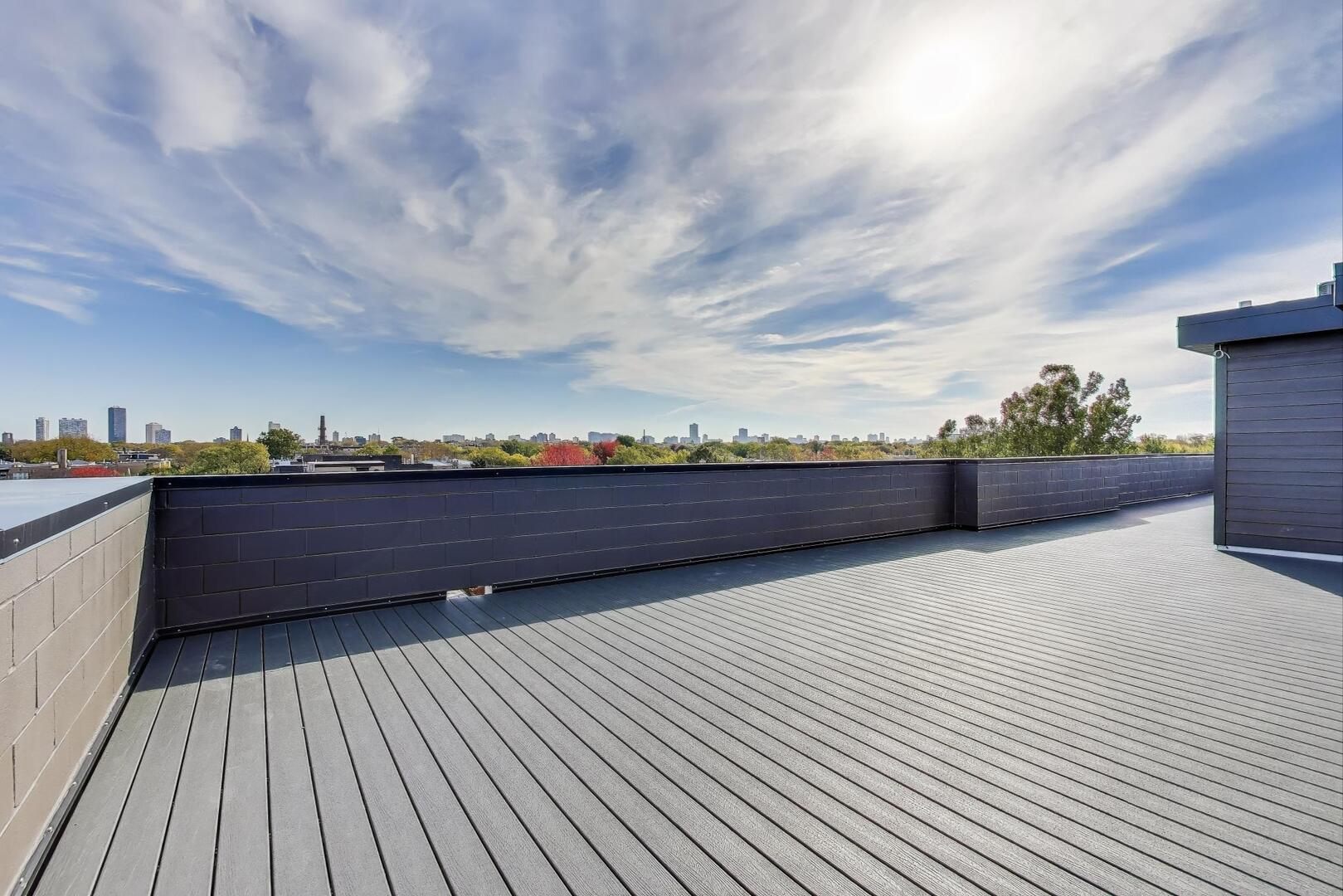 2307 West Foster Avenue, Unit 3 Chicago, IL 60625 - Photo 40 of 48 a view of outdoor space with wooden floor