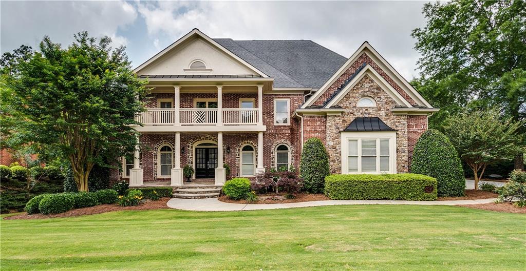2320 Clement Road Cumming, GA 30041 - Photo 1 of 1 Four sided brick home featuring 6 bedrooms, 5 bathrooms, beautiful landscaping and loads of curb appeal!