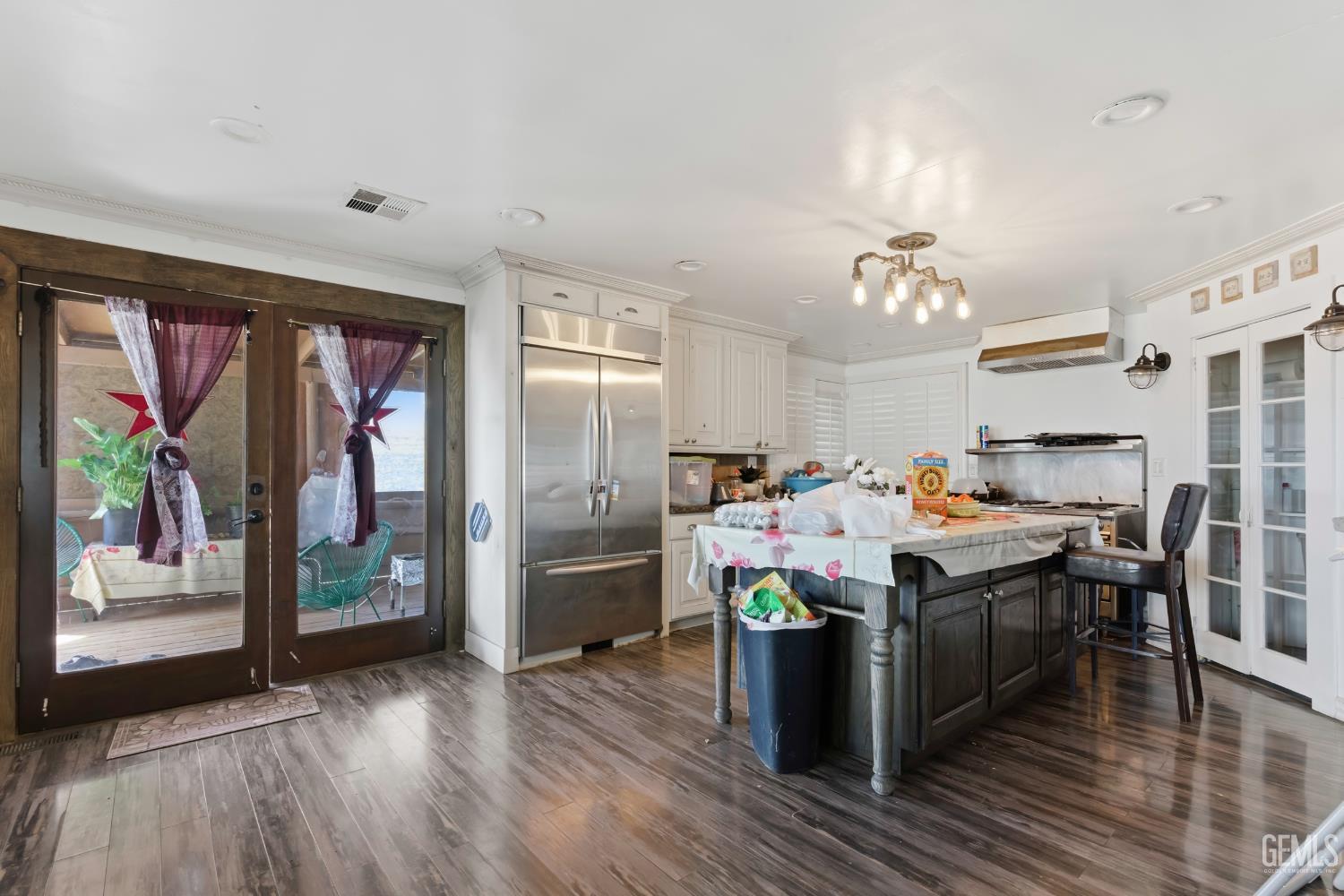 Undisclosed Address Maricopa, CA 93252 - Photo 3 of 40 a view of a dining room with furniture wooden floor and chandelier