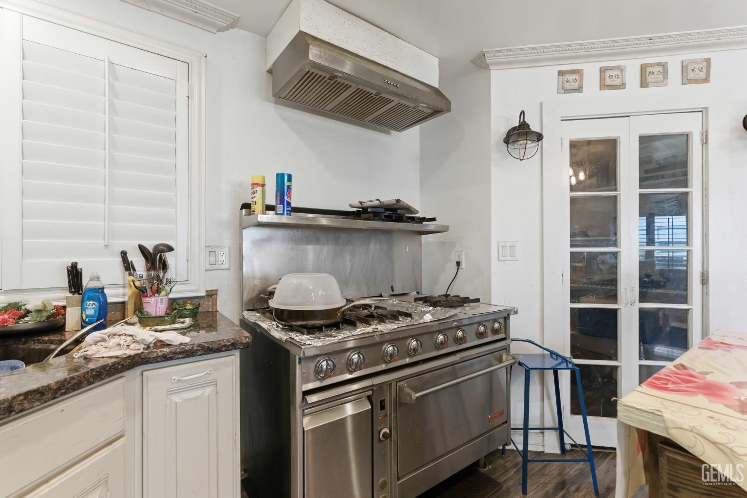 Undisclosed Address Maricopa, CA 93252 - Photo 7 of 40 a kitchen with stainless steel appliances granite countertop a stove and a sink