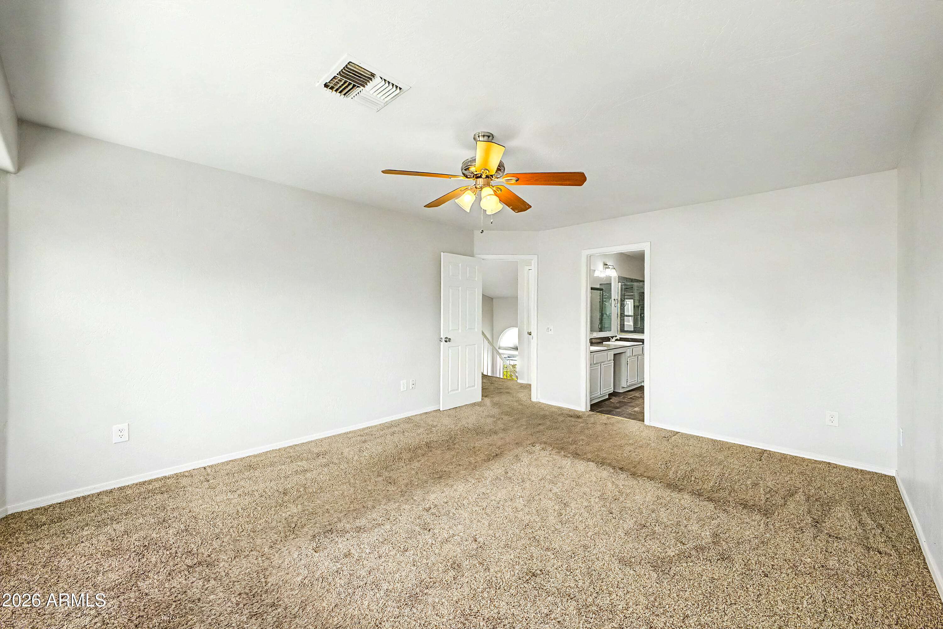 3134 East McKellips Road, Unit 221 Mesa, AZ 85213 - Photo 11 of 29 a view of empty room with wooden floor