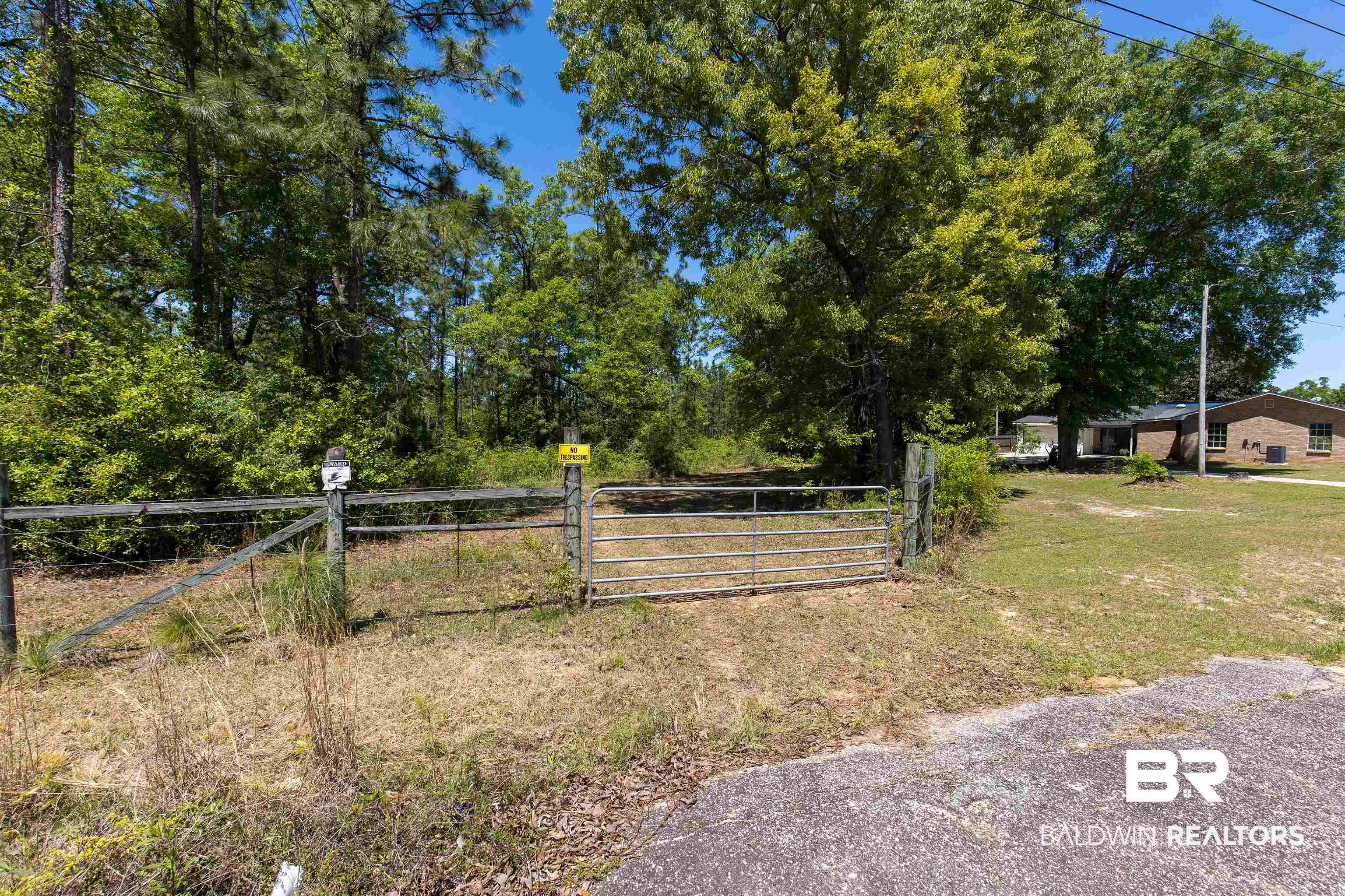 41500 Whitehouse Fork Road Bay Minette, AL 36507 - Photo 6 of 18 View of yard featuring a gate and fence