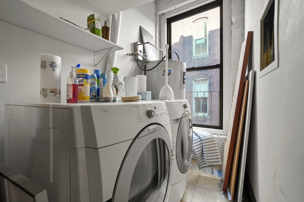 96 South Street, Unit 3 Boston, MA 02111 - Photo 17 of 17 a utility room with dryer and washer