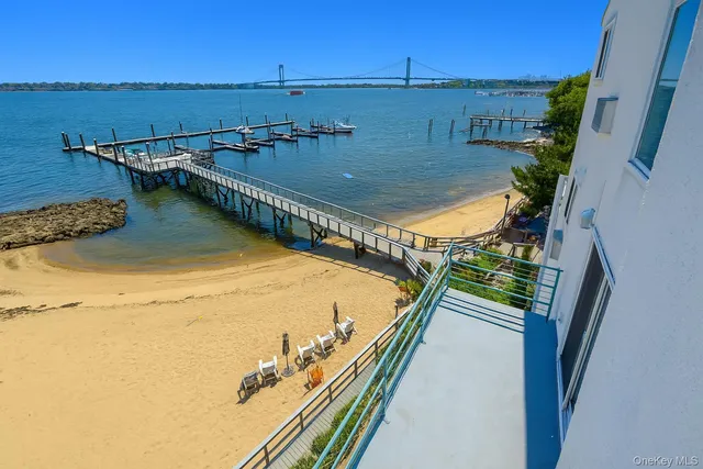 a view of a balcony with an ocean